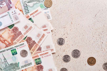 Russian rubles banknotes and coins background. Payment in rubles concept. Currency exchange,...