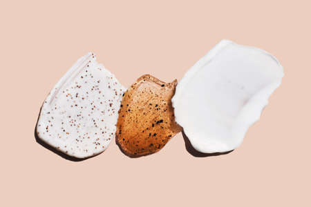 Different natural cosmetic products Swatches set with particles. Face or body Skin care cream, face...