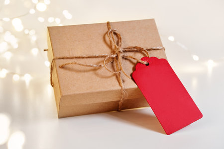 Christmas sustainable gift box with blank red card. Christmas zero waste, boxing day and winter holidayの写真素材