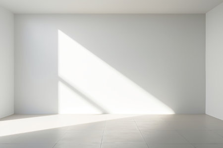 Modern white Interior with geometrical sunlight and shadows. Empty wall mockupの素材