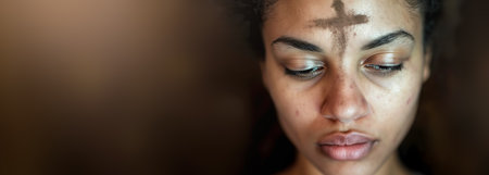Humble woman with an ashen cross on her forehead. Ash wednesdayの素材