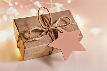 Christmas sustainable gift box with blank gift card in mocha mousse colorの写真素材