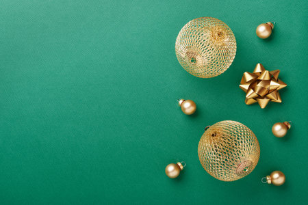 Golden baubles creating festive christmas and new year holiday flat lay, copy space