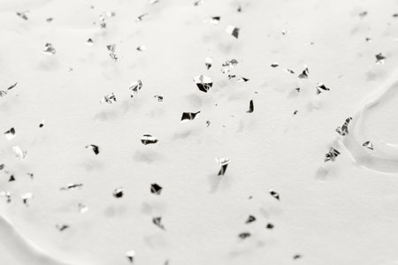 White gel texture with tiny shiny silver pieces. Color of the Year conceptの写真素材