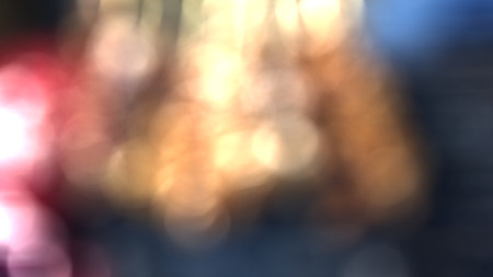 Blurred bokeh of car in city at night. Abstract background
