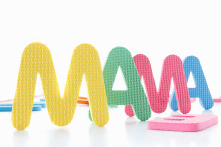 Inscription Mom from color letters concept isolateの写真素材