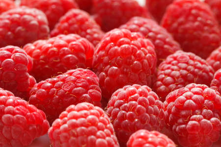 Fresh sweet raspberries close up.