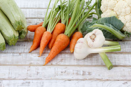 Fresh vegetables on a wooden backgroundの写真素材