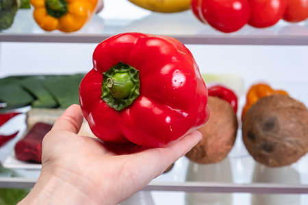 Fridge frozen ingredient meal nature nutrition, hands peper.の写真素材