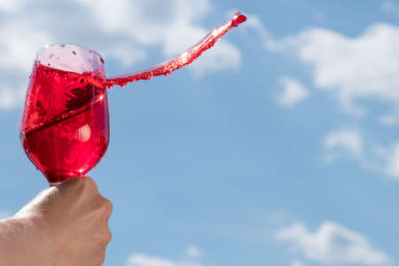Drink sky glass color wine, beautiful background.の写真素材
