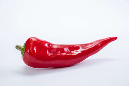 Pepper paprika whole isolated sweet vegetable ingredient. fresh whiteの写真素材
