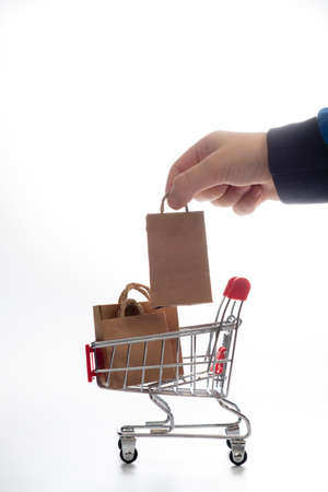 Cart packages white background like finger. packaging handの写真素材