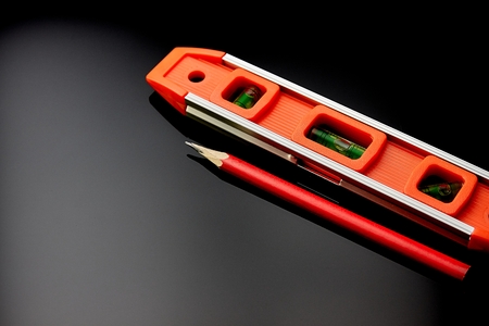 Optical level lies on the surface of the floor to check