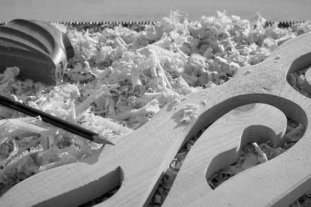 measuring tape, pencil and saw important tools when sawing wood boards and platbands