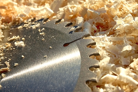 Wood chips, chips and circular saw bladeの写真素材