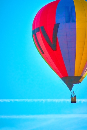 colorful hot air balloons against blue sky. Can be used as a backgroundの写真素材