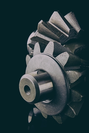 Gears, bearings and differential stars lie on the table close-upの写真素材