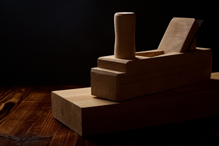 Vintage and the right set of carpenters tools on the dark background closeupの写真素材