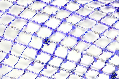 Fabric with sequins and sequins of bright colors. Fashion glitter fabric, sequins. Shiny surface