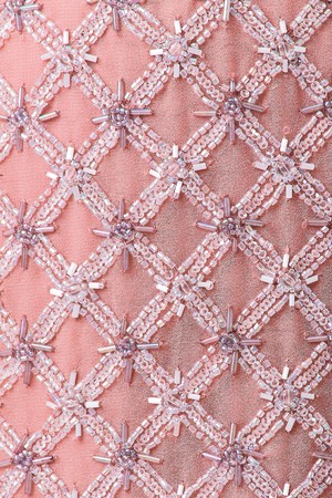 Fabric with sequins and sequins of bright colors. Fashion glitter fabric, sequins. can be used as backgroundの写真素材