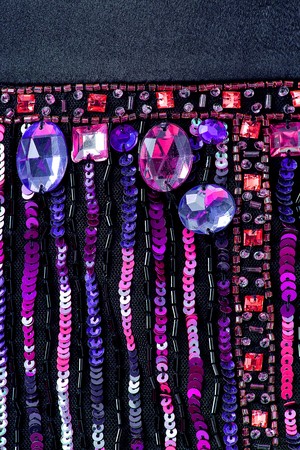 Fabric with sequins and sequins of bright colors. Fashion glitter fabric, sequins. can be used as...