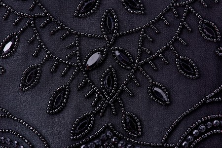 Fabric with sequins and sequins of bright colors. Fashion glitter fabric, sequins. can be used as backgroundの写真素材