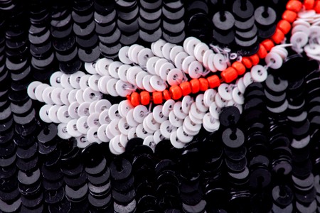 Fabric with sequins and sequins of bright colors. Fashion glitter fabric, sequins. can be used as backgroundの写真素材