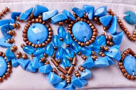 Fabric with sequins and sequins of bright colors. Fashion glitter fabric, sequins. can be used as backgroundの写真素材