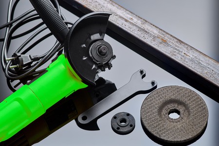 angle grinder for metal on dark background close-up
