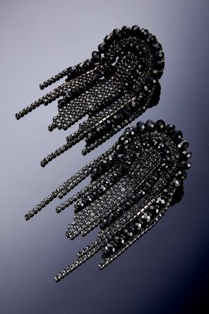 Plastic earrings jewelry with crystals and stones for women for fashion and for every dayの写真素材
