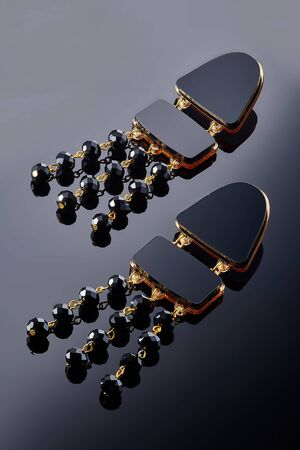 Plastic earrings jewelry with crystals and stones for women for fashion and for every dayの写真素材