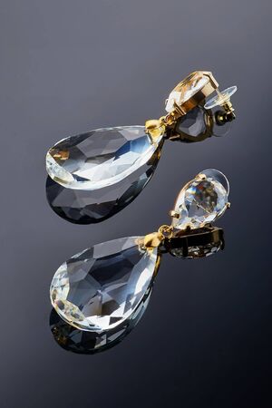 Plastic earrings jewelry with crystals and stones for women for fashion and for every dayの写真素材