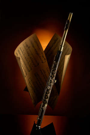 vintage wooden clarinet on a dark background. Can be used as a backgroundの写真素材