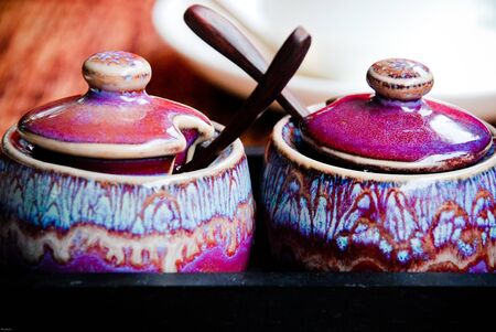 handmade ceramic sugar and spice containers の写真素材