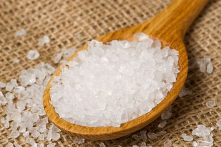 Salt in a wooden spoon