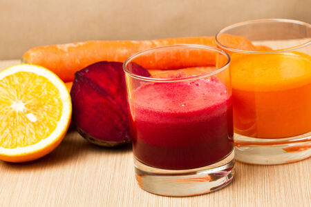 Beetroot, carrots with orange juiceの写真素材
