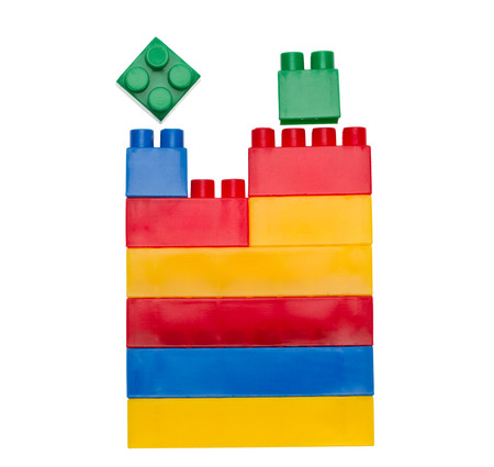 Colored toy bricks isolated on white