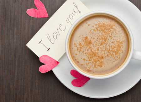 Note paper with message of love and cafee cupの写真素材