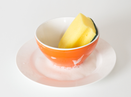 Washing dishes.Plate and bowlの写真素材