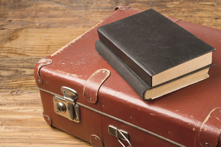 Old suitcase and old books の写真素材