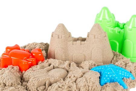 Sand with child toys isolated on white backgroundの写真素材