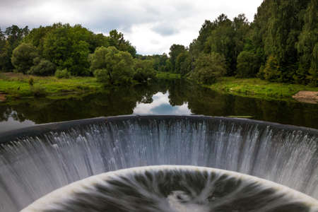 River in Moscow district. Waterfall.