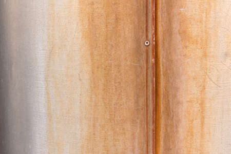 Texture of rusty iron. Trumpet. Colorful texture of rusty iron. Rust over the seam.