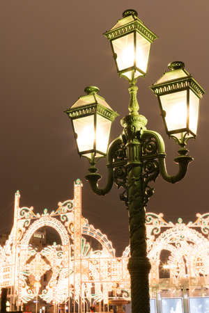 Christmas lighting in Moscow. Historic street lamp in front of the Bolshoi Theater.の写真素材
