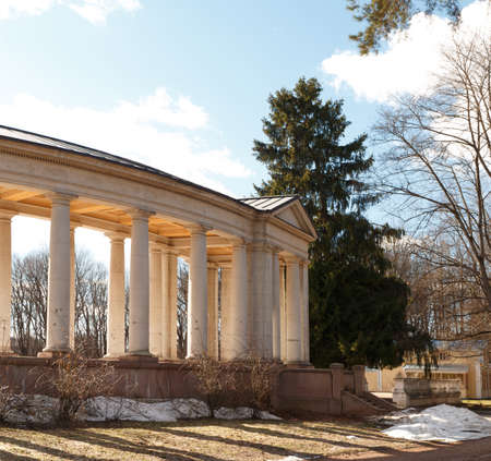 Manor Arkhangelskoe. Temple-tomb Colonnade . Spring in the park. Russian old manor at sunset. Classical architecture. Temple-tomb Yusupov in Manor Arkhangelskoe - the palace and park ensemble of the late XVIII - early XIX century in Moscow.の写真素材