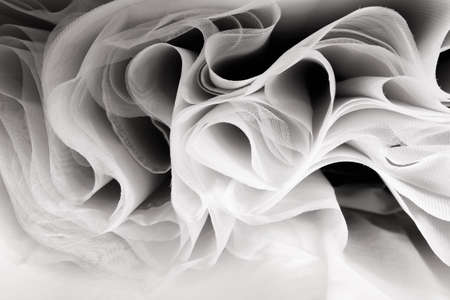 Abstract soft chiffon texture background. Waves of soft cloth