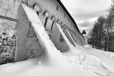 Savvino-Storozhevsky monastery in Zvenigorod in winter day. Moscow region. Architecture of the ancient Russian monastery. Black and white photograph of ancient Russian religious architecture.の写真素材