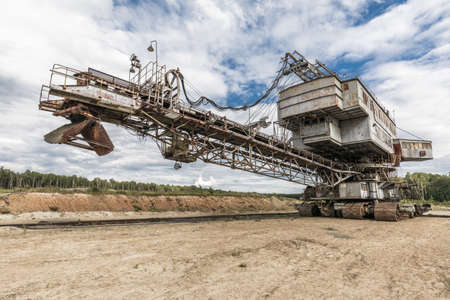 Heavy equipment. Multi bucket excavator, giant stacker, absetzer in career. Giant excavator. Russia
