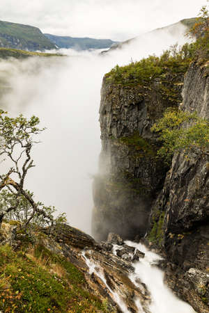 Beautiful view of the Voringsfossen waterfall. Bjoreio river . National park Hardangervidda,...