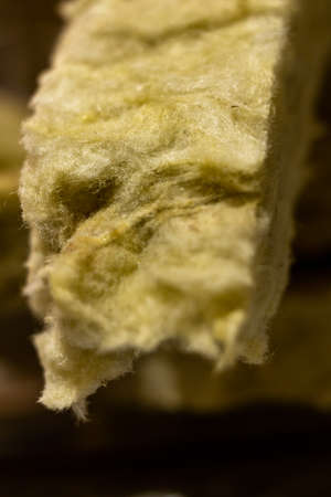Thermal insulation material, rock wool. Thermal roof insulation layer.
